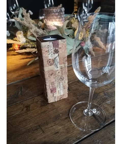 Decorative handmade candlestick, made of wood and cork mosaic.