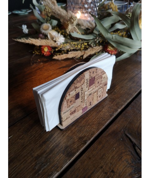 Handmade decorative semicircular napkin holder made of wood and wine cork.