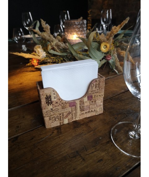 Handmade rectangular decorative napkin holder made of wood and wine cork.