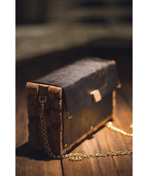 Stylish, designer clutch bag made of cork and handmade leather.