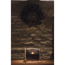 Author's leather clutch bag and champagne cork