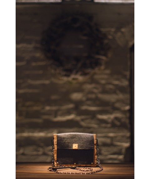 Designer clutch bag made of leather and champagne cork.