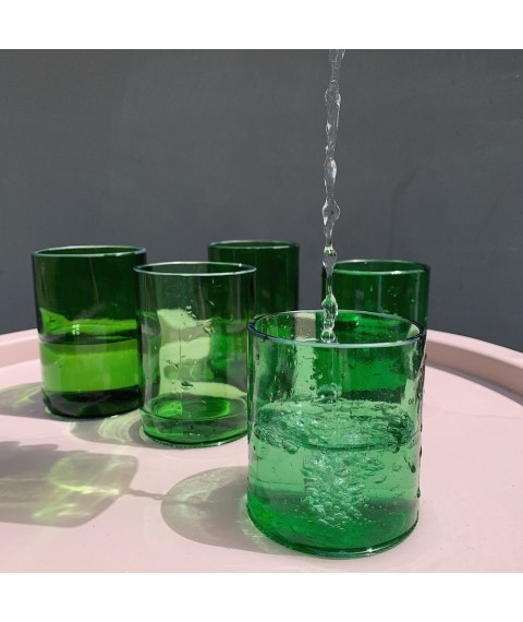 Green glass made of rescued glass