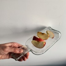 Gebackene transparente Weinflasche mit Griff