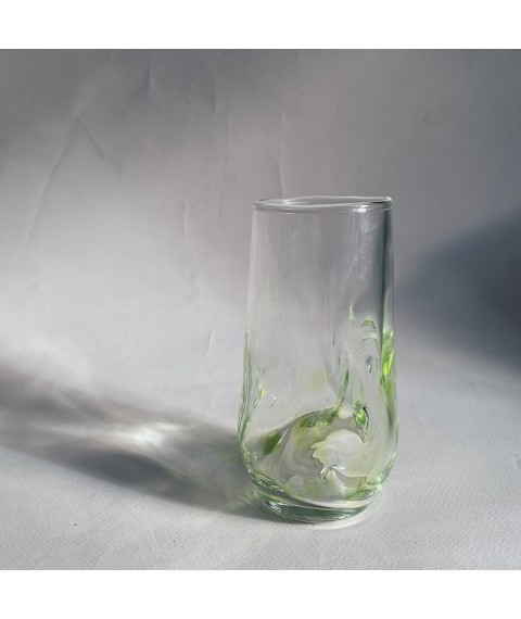 Glass of green ice