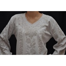  The embroidered shirt is made of handmade beads
