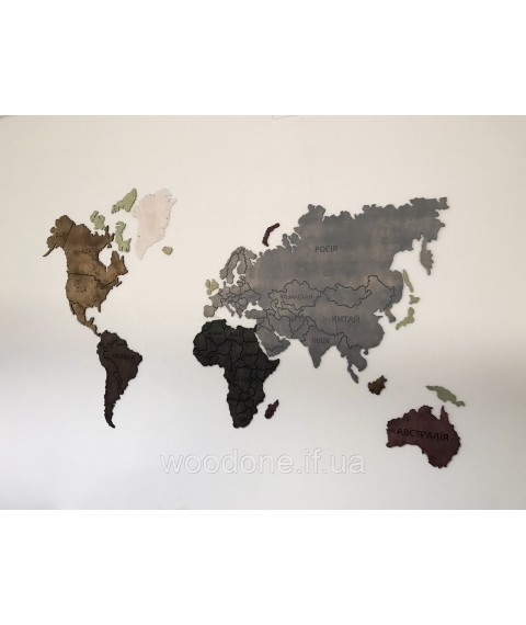 World map on the wall toned with different colors
