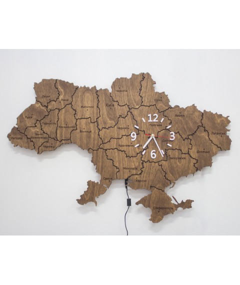 Karte der Ukraine aus Hintergrundbeleuchtung und Uhr