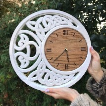 Wooden clock with ornament