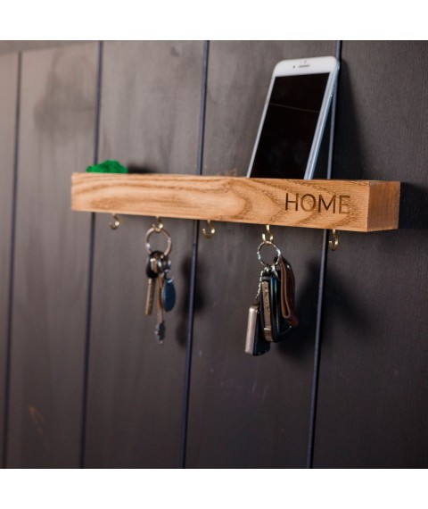 Wooden key holder made of moss and a shelf