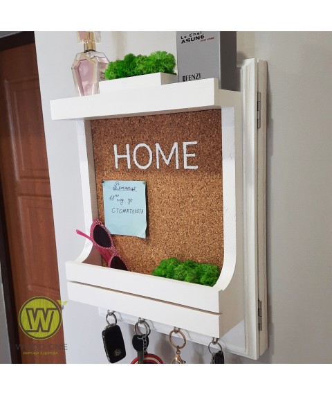 Key holder made of moss and a shelf. Close the flap!