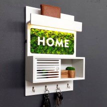 Moss key holder. Close the flap in the hallway!
