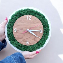 Modern wall clock with moss.