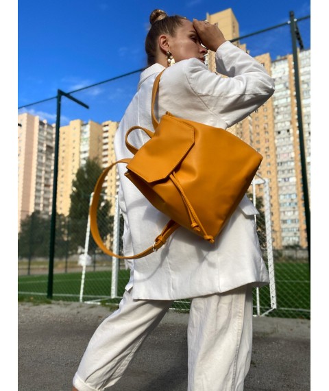 Backpack female urban medium with a flap with a tightening on the button lightweight soft eco-leather mustard yellow