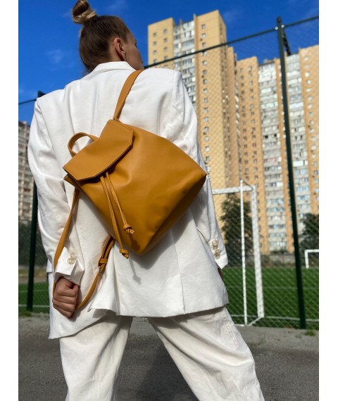 Рюкзак жіночий міський середній з клапаном із затяжкою на кнопці легкий м 'який з екокожі гірчичний жовтий