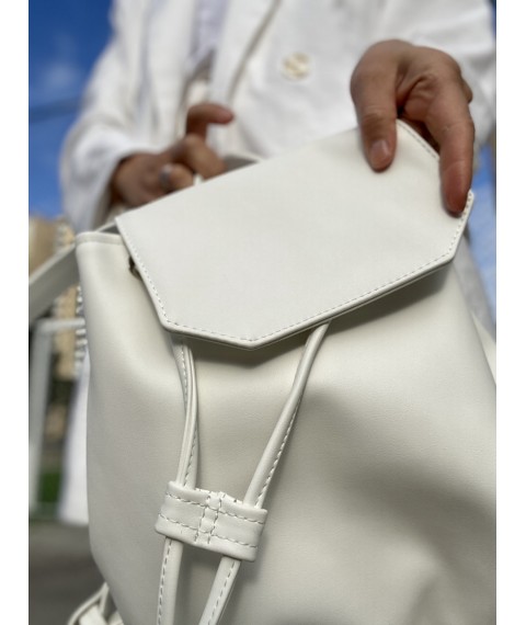 Backpack female urban medium with a flap with a tightening on the button lightweight soft eco leather white