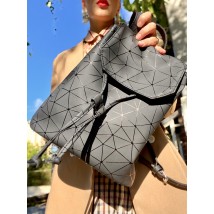 Backpack female urban medium with a flap with a tightening on the button lightweight soft eco-leather black rhombuses