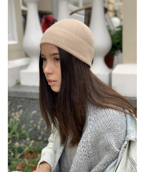 Fashionable knitted women's hat with a turn-up thin woolen beige
