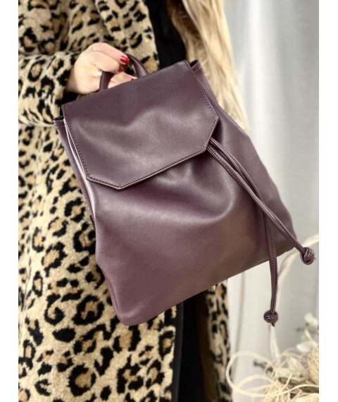 Backpack female urban medium with a flap with a tightening on the button soft eco leather black matte purple