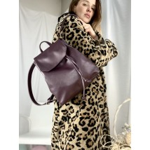 Backpack female urban medium with a flap with a tightening on the button soft eco leather black matte purple