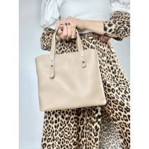 Rectangular light beige medium size women's bag with three compartments and a long strap