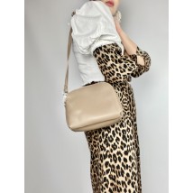 Women's laconic bag with three compartments and a back pocket with a long strap made of eco-leather dark beige