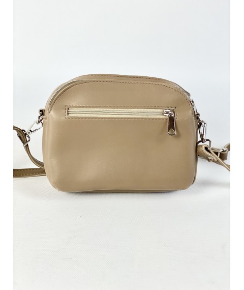 Women's laconic bag with three compartments and a back pocket with a long strap made of eco-leather dark beige
