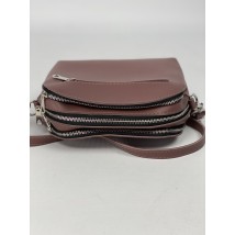 Women's laconic bag with three compartments and a back pocket with a long strap made of eco-leather matte burgundy