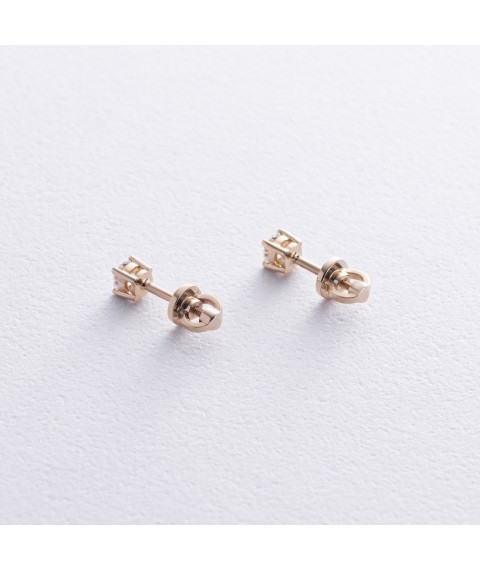 Earrings - studs with diamonds (yellow gold) 331393121 Onyx
