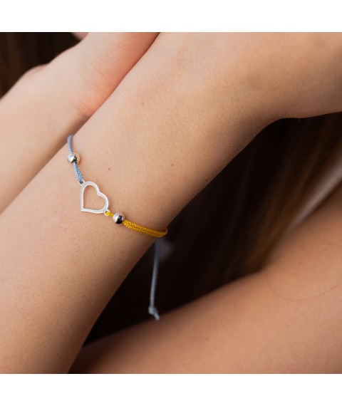 Silver bracelet "Ukrainian heart" (blue and yellow thread) 312/2 Onyx
