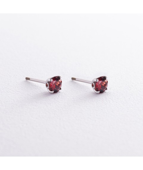 Gold earrings - studs with pyropes s08411 Onyx