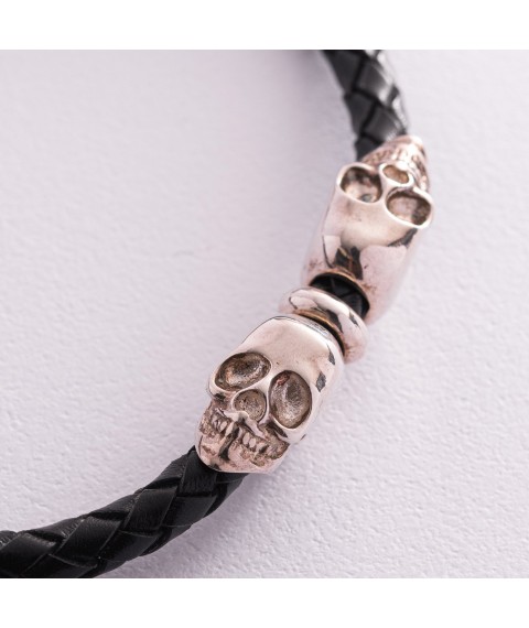 Кожаный браслет с серебряными вставками черепов 141241 Онікс 20