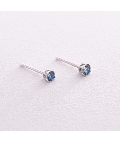 Gold earrings - studs (topaz "London blue") sb0115gl Onyx
