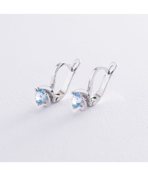 Gold earrings with blue topaz s02407 Onyx