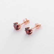 Gold stud earrings with pyrope s06307 Onyx