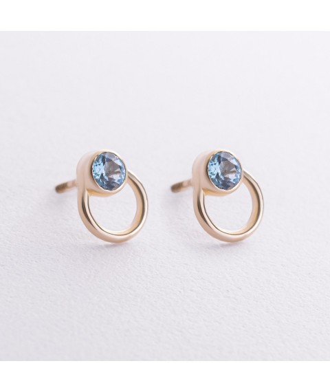 Earrings - studs "April" with blue topaz (yellow gold) s08773 Onyx