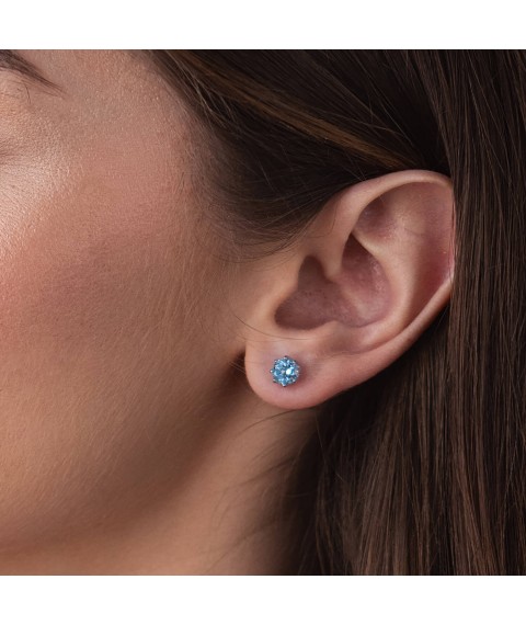 Gold stud earrings with blue topaz s06403 Onyx