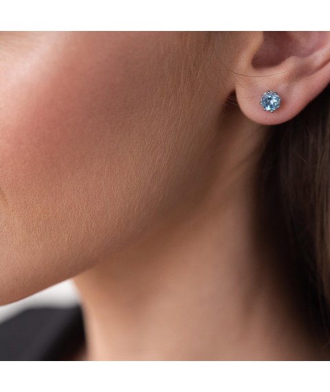 Gold stud earrings with blue topaz s06403 Onyx