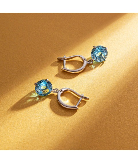 Gold earrings "Attraction" with blue topaz s05290 Onyx