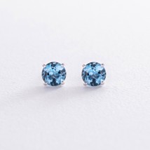 Gold earrings - studs with blue topaz s08410 Onyx