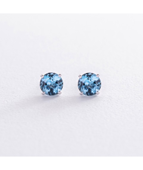 Gold earrings - studs with blue topaz s08410 Onyx