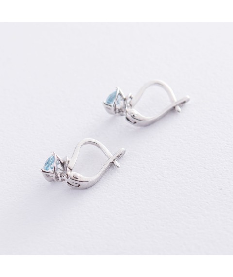Gold earrings with blue topaz s02407 Onyx