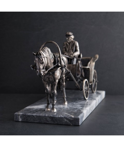 Handmade silver figure of Onyx cabman