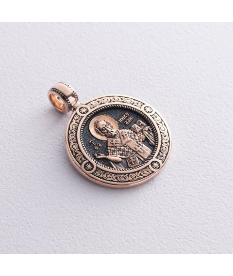 Gold pendant "St. Nicholas the Wonderworker" with blackening p02410 Onyx