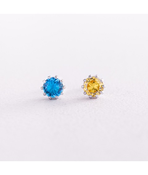 Срібні сережки - пусети (блакитне та жовте каміння) 308 Онікс