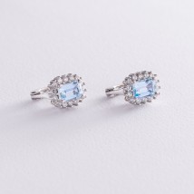 Серебряные серьги с голубыми топазами и фианитами 121365 Онікс