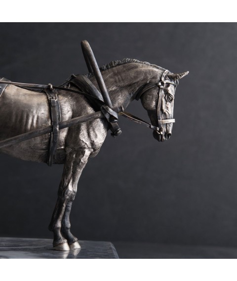 Handmade silver figure of Onyx cabman