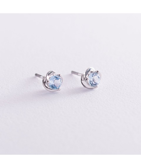 Gold stud earrings with blue topaz s02404 Onyx