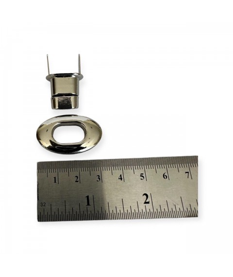 Oval bag lock 30 mm. light nickel