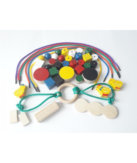 The HEGA Montessori 3 set is a complicated educational game, colored in a box of 46 elements